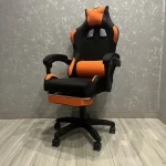 Яскраве геймерське крісло Pegie Prestige чорно-помаранчеве
